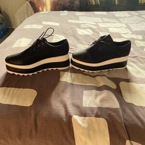 Black Oxford platform shoes for ladies or guys